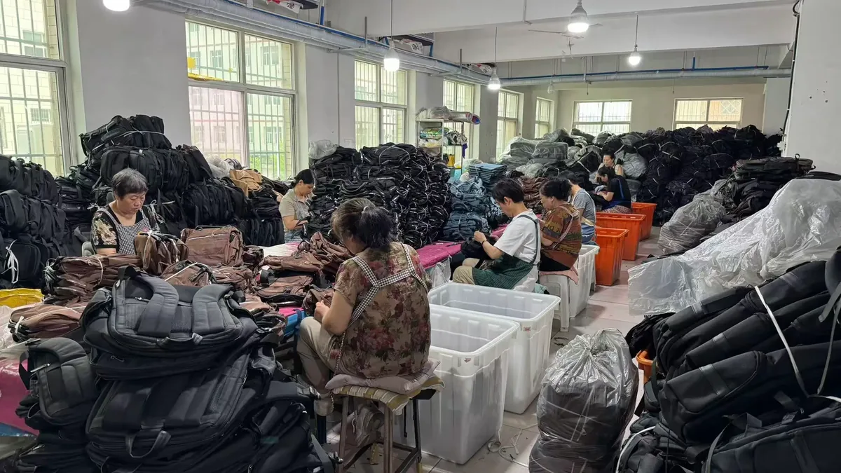 Backpack quality inspection and finishing line